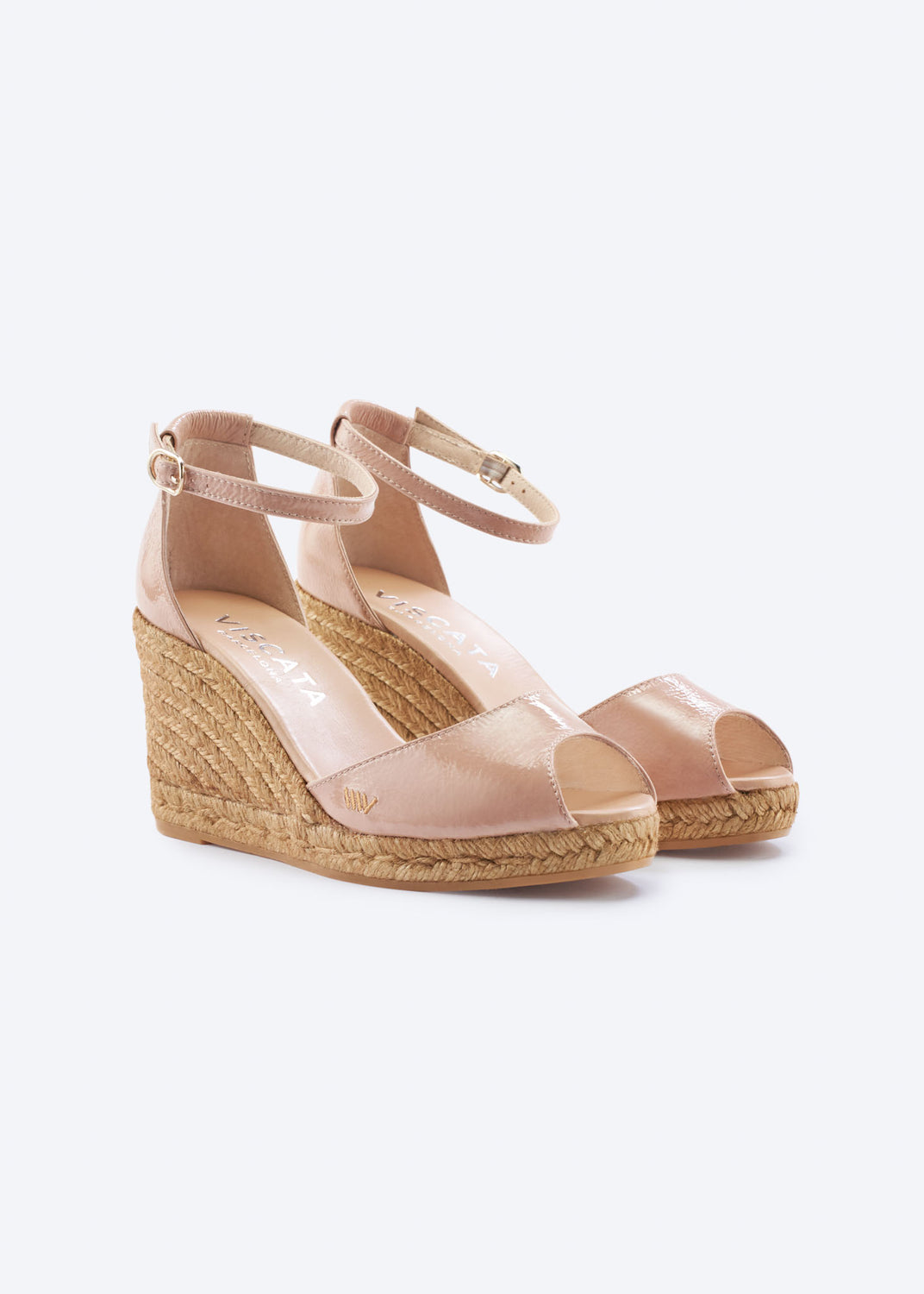 Blush pink leather wedge espadrille sandals with ankle straps, open toe, and a natural braided jute wedge, handcrafted in Spain