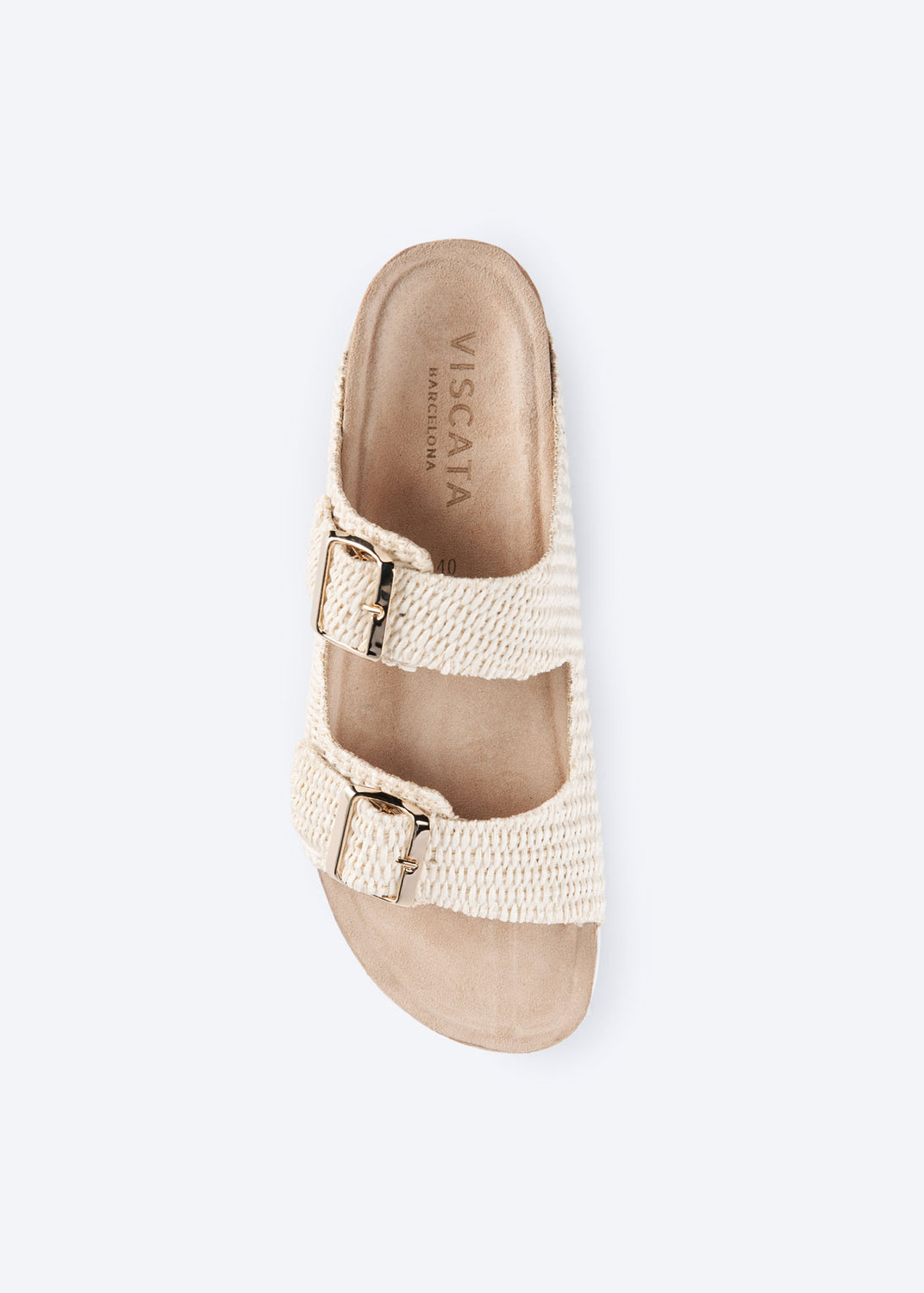 Top view of a natural raffia double-buckle slide sandal.