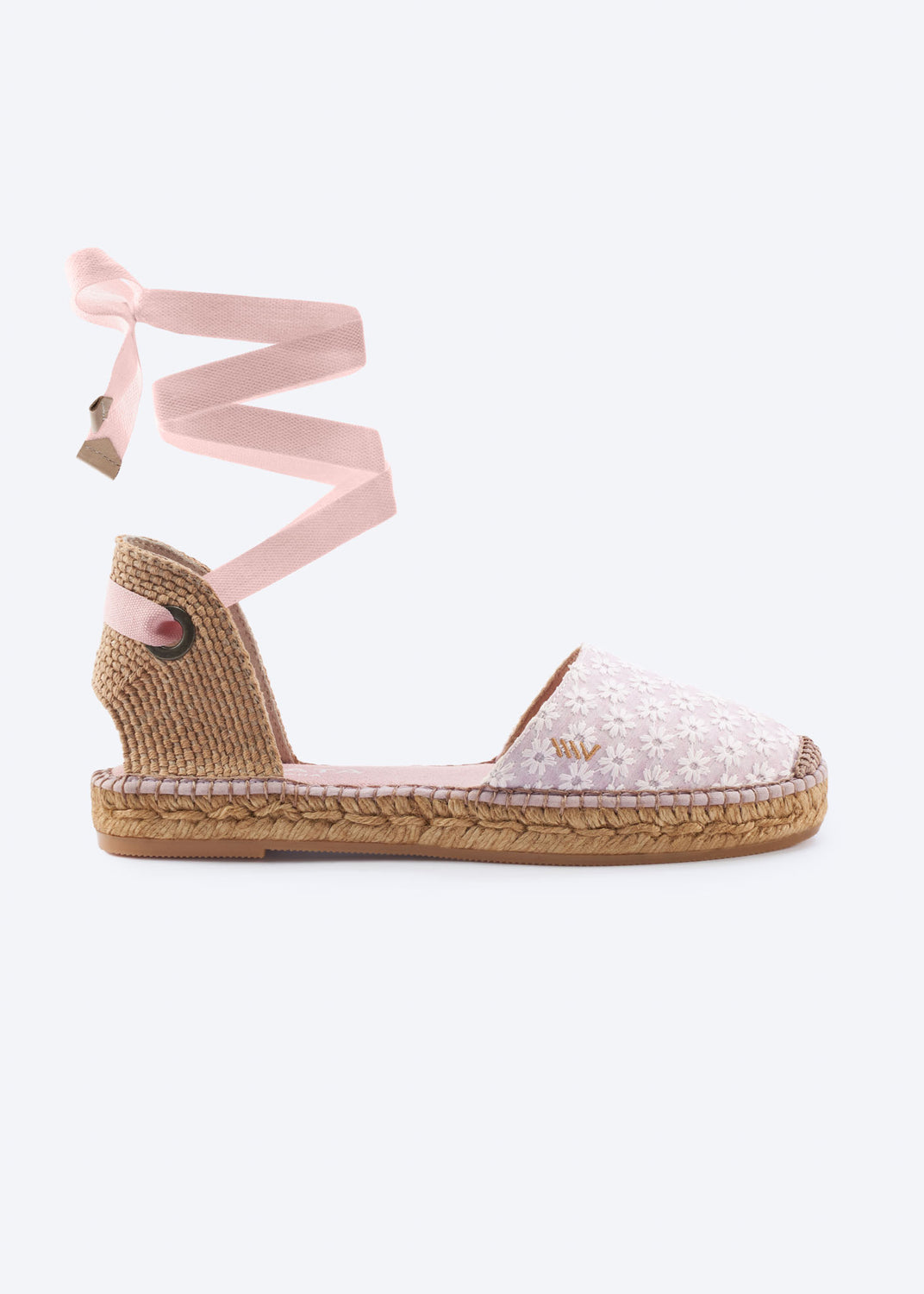 Daisy pink espadrille flat with wraparound ankle ties and embroidered floral detail, in side view.