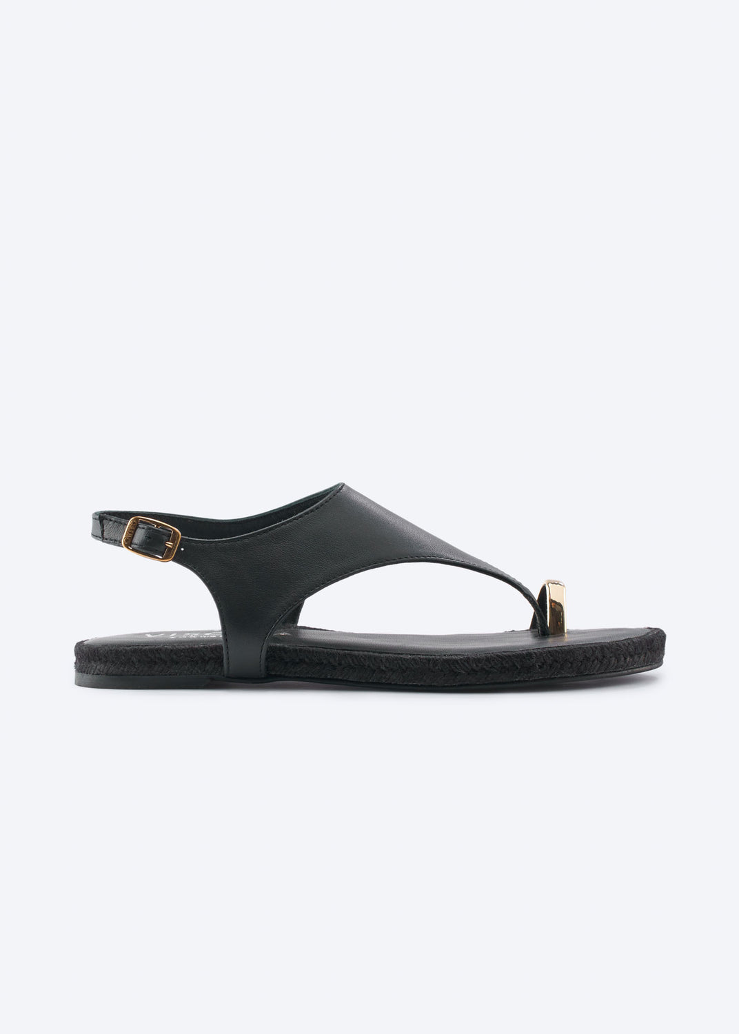 Side profile of a black leather thong sandal with gold-tone detail.