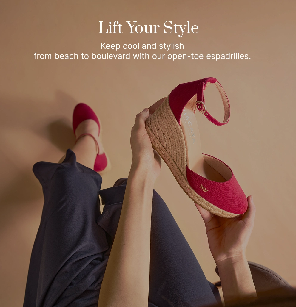 Cherry red closed-toe wedge espadrilles with ankle strap by Viscata, handcrafted in Spain with natural jute soles. Comfortable and stylish summer shoes perfect for beach to city wear.