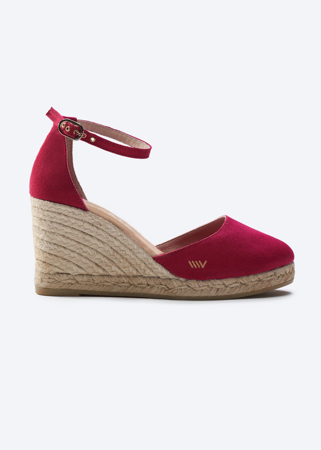 Red wedge sandal with jute sole on a white background