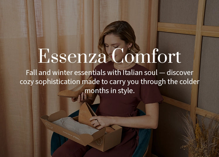 Woman opening a Viscata shoebox with suede shoes from the Essenza fall-winter collection.