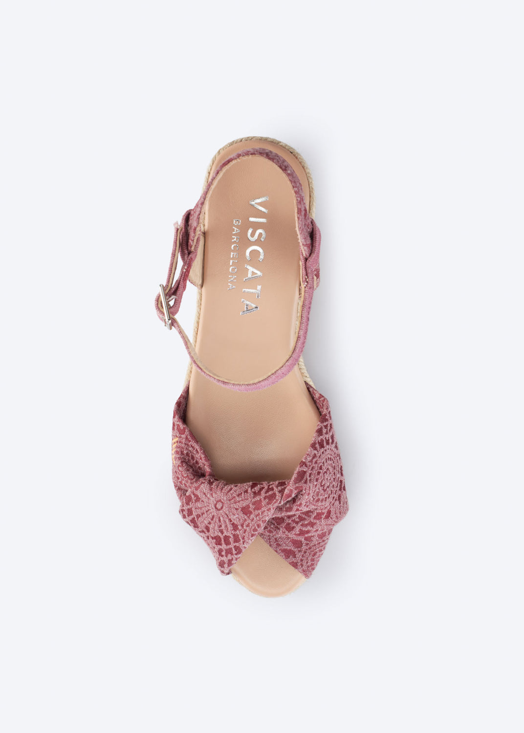 Top view of pink crochet espadrille sandal with knotted front and ankle strap.