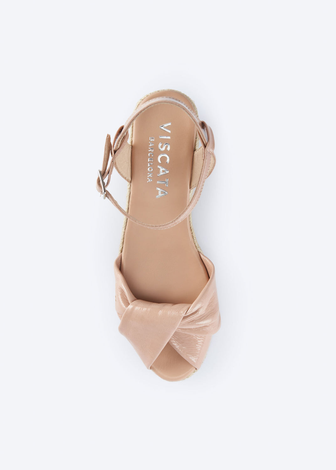 Top view of pink leather espadrille sandal with knotted front detail and ankle strap.