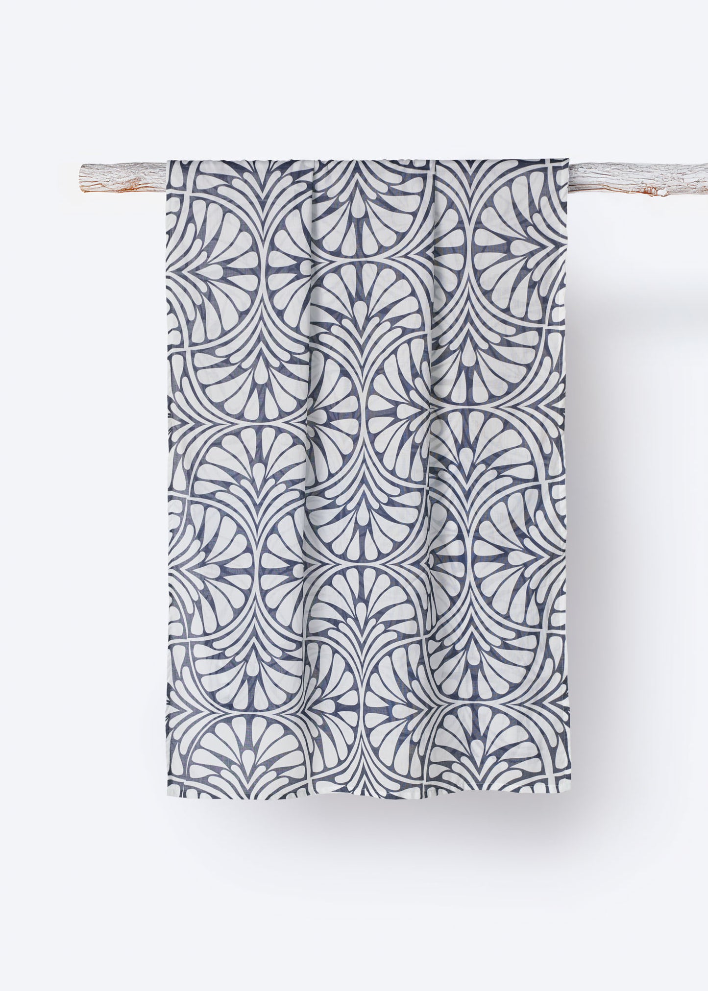 Blue Palms foulard displayed hanging, featuring a repeating navy and white geometric palm pattern on lightweight cotton fabric