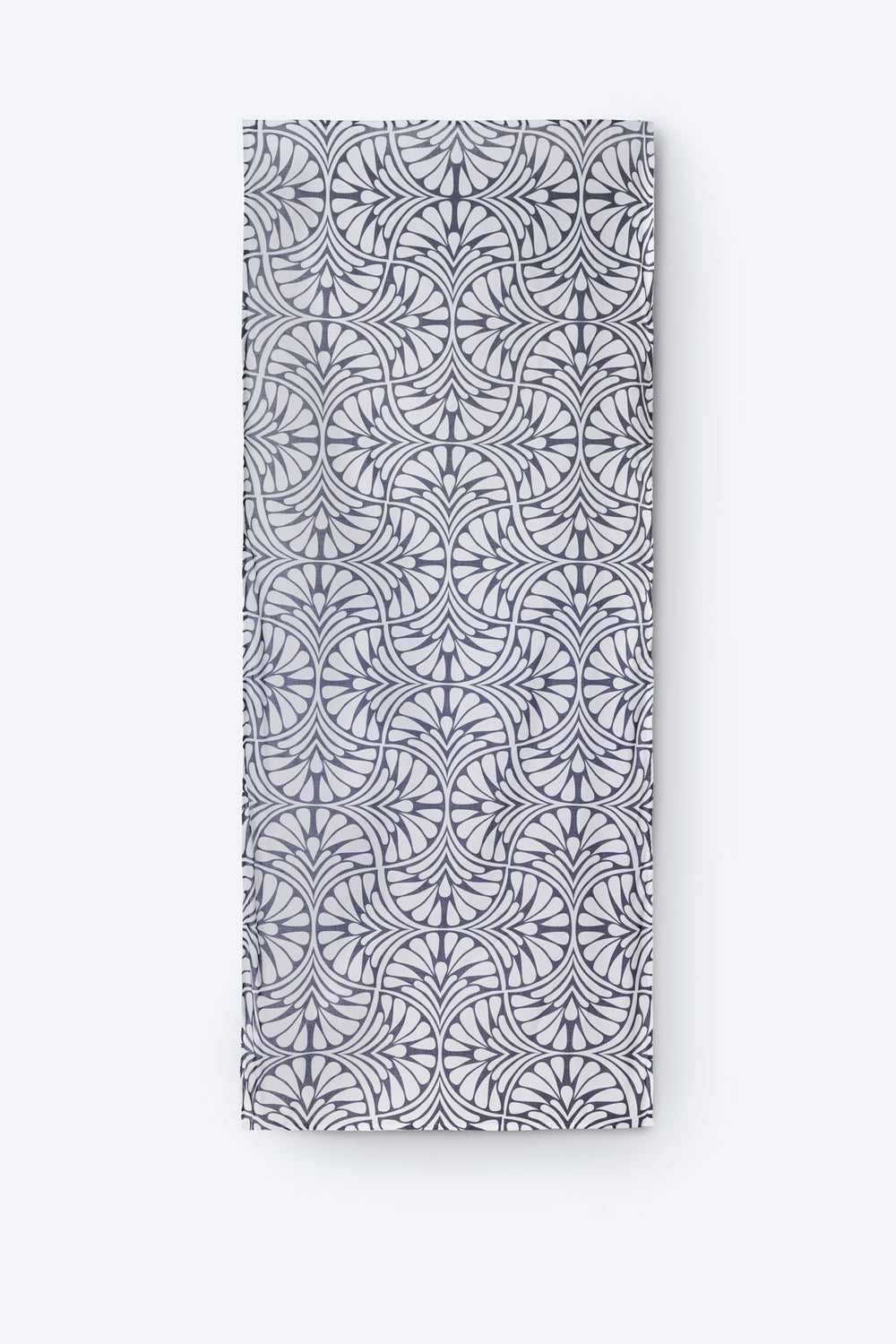 Flat lay of the Blue Palms foulard, showcasing its full-length geometric palm motif in navy and white on lightweight cotton fabric