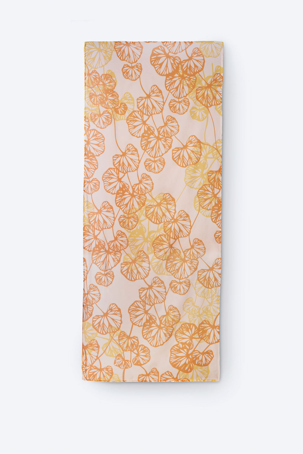 Lightweight rectangular scarf in soft blush pink with vibrant orange and yellow botanical leaf print – breathable and stylish accessory perfect for sunny days, travel, and casual layering