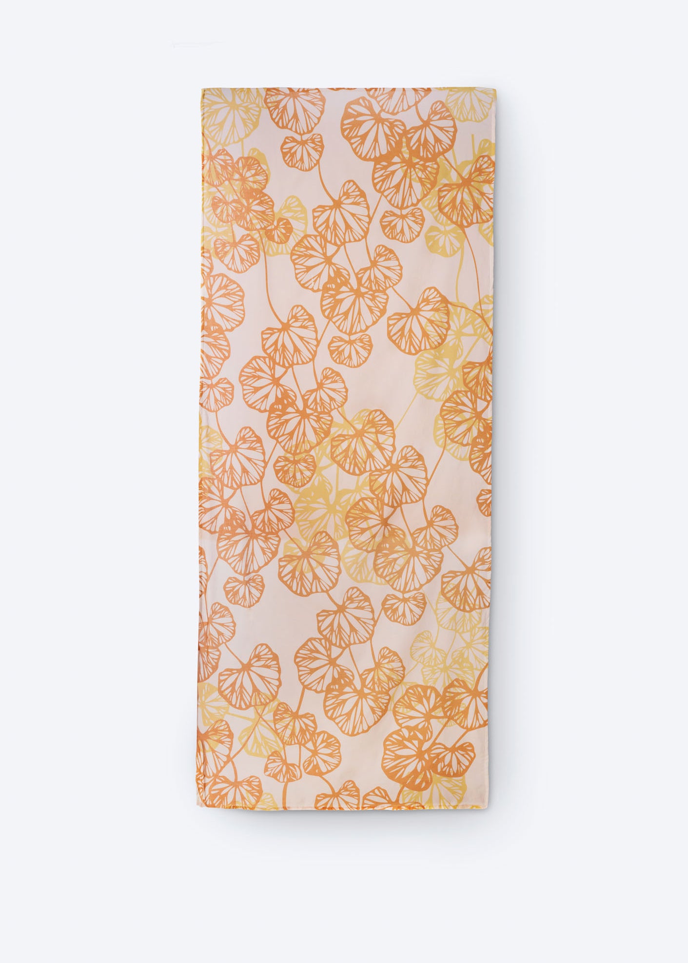 Lightweight rectangular scarf in soft blush pink with vibrant orange and yellow botanical leaf print – breathable and stylish accessory perfect for sunny days, travel, and casual layering