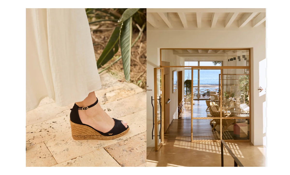 A split image showing a black wedge sandal with an ankle strap worn on a foot, alongside a view of a modern interior hallway with glass doors and a view of the ocean in the distance.