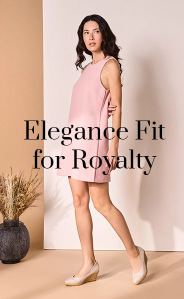 Woman wearing handmade silver wedge espadrilles with a natural jute sole, paired with a pink sleeveless dress, showcasing Viscata’s elegant and comfortable Mediterranean-inspired footwear