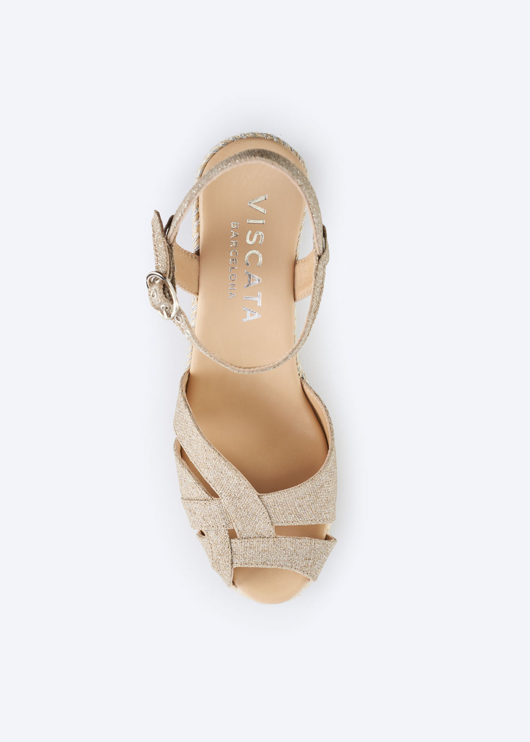 Silver metallic espadrille sandal with woven crossover straps and braided jute sole viewed from above.