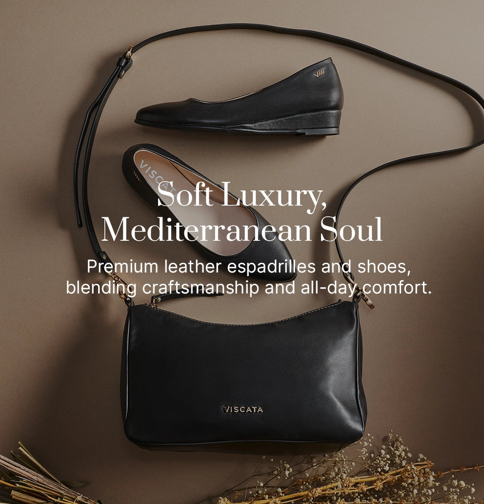 Black leather Viscata women's flats paired with a matching black leather crossbody bag, showcasing Mediterranean-inspired craftsmanship and timeless comfort.