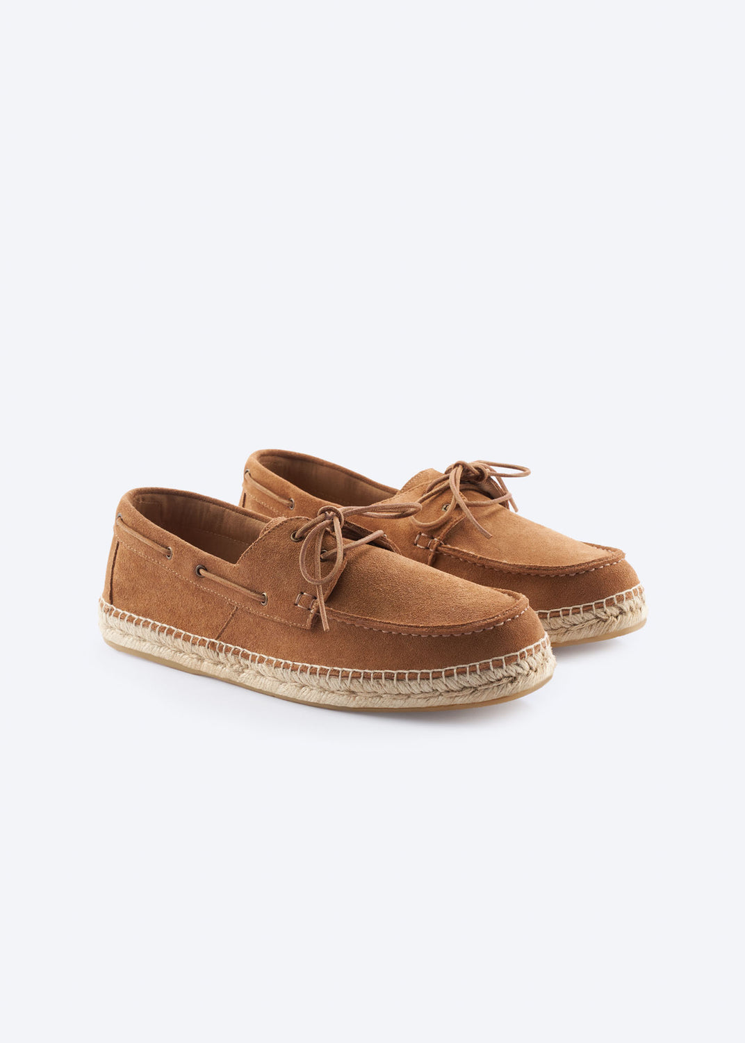 Pair of men’s tan suede espadrille boat shoes with lace detail and natural jute-wrapped soles, shown on a clean white background.
