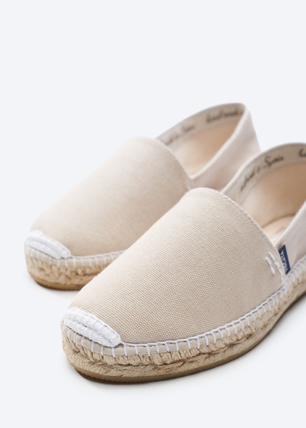 Llafranc Beige Canvas Slip On Women Espadrille Flats Closed Toe White Stitch Detail