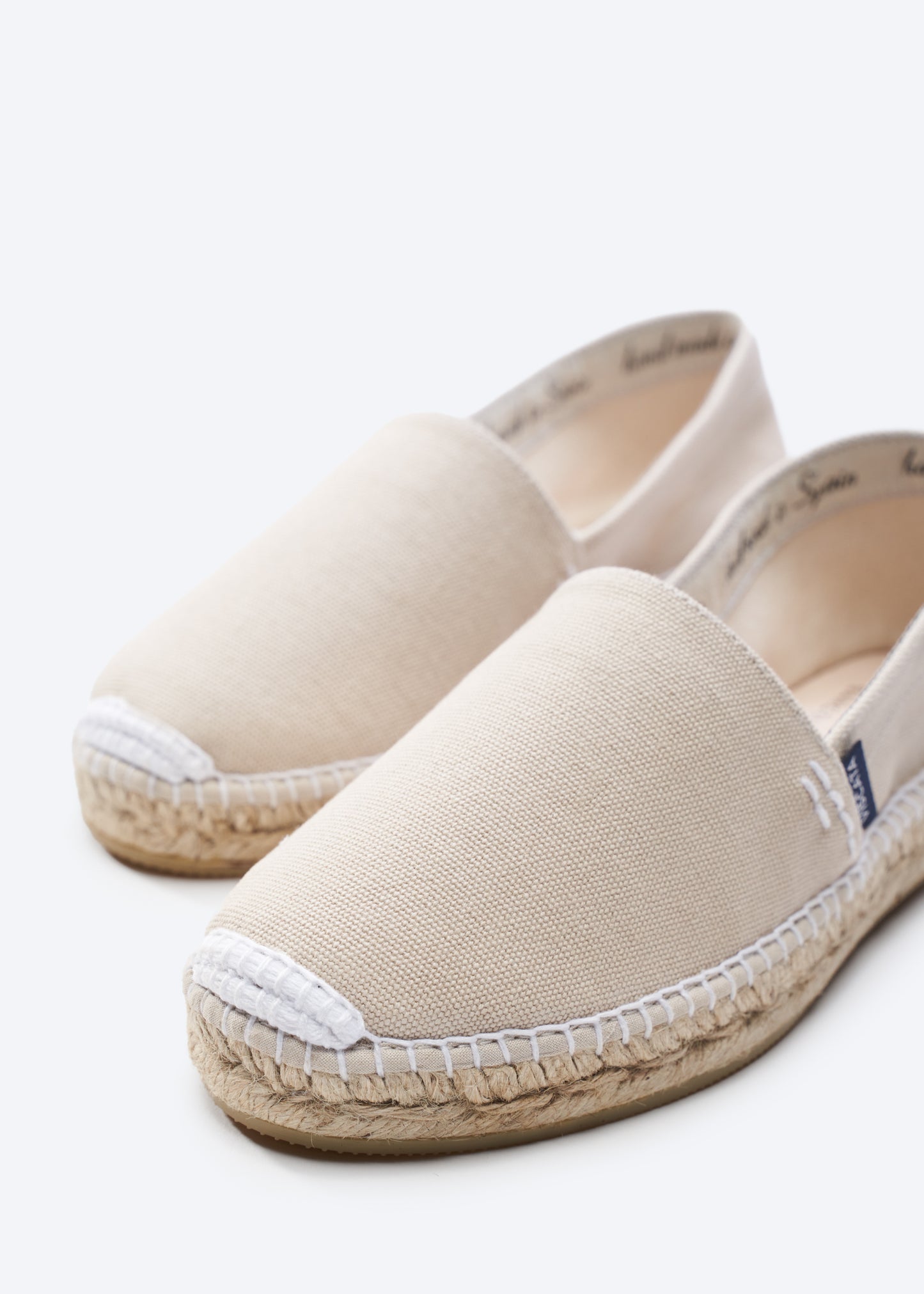 Llafranc Beige Canvas Slip On Women Espadrille Flats Closed Toe White Stitch Detail