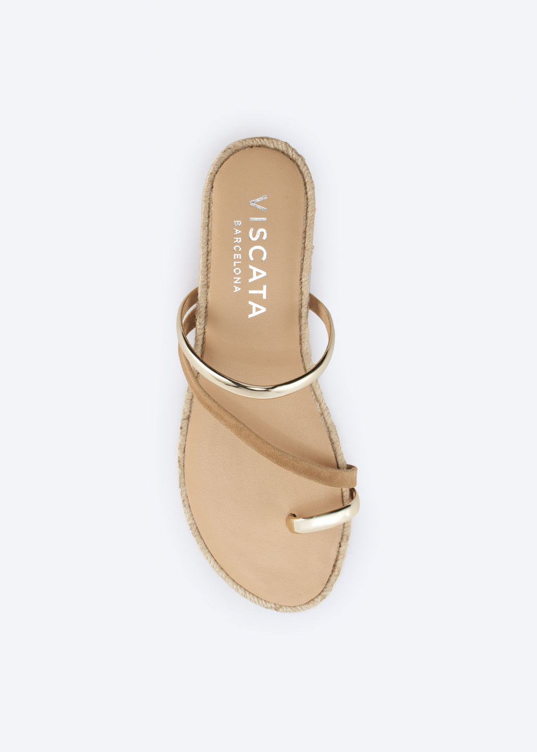 Top view of tan suede flat sandals with metallic straps.