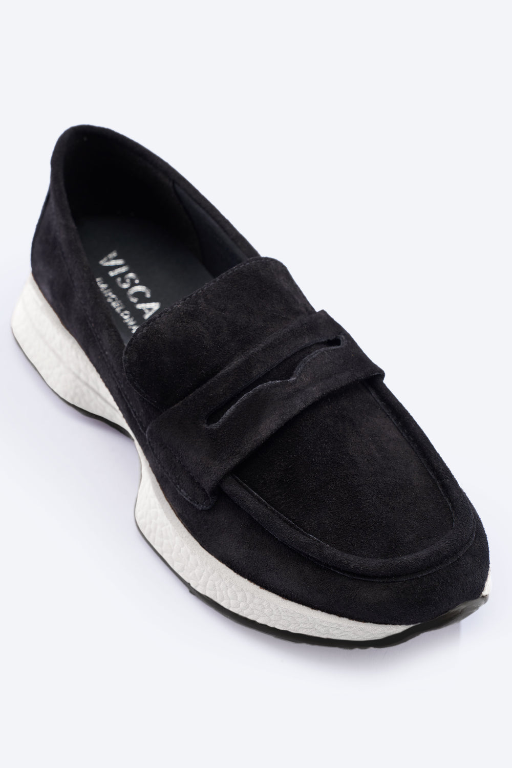 Modena Black Suede Loafer with Chunky White Platform Sole and Black Treaded Outsole Front View