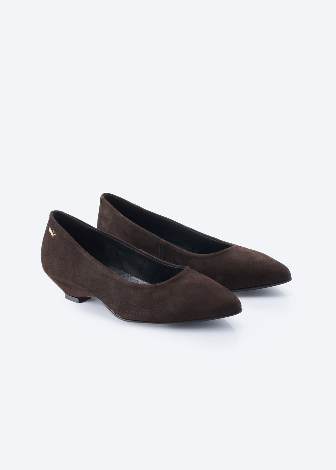 A pair of dark brown suede pointed-toe flats with low block heels, displayed on a clean white background.