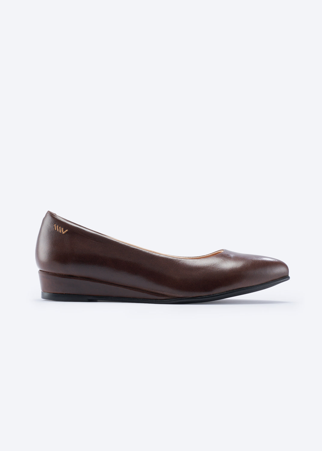 A single brown flat shoe shown in profile against a light gray background.