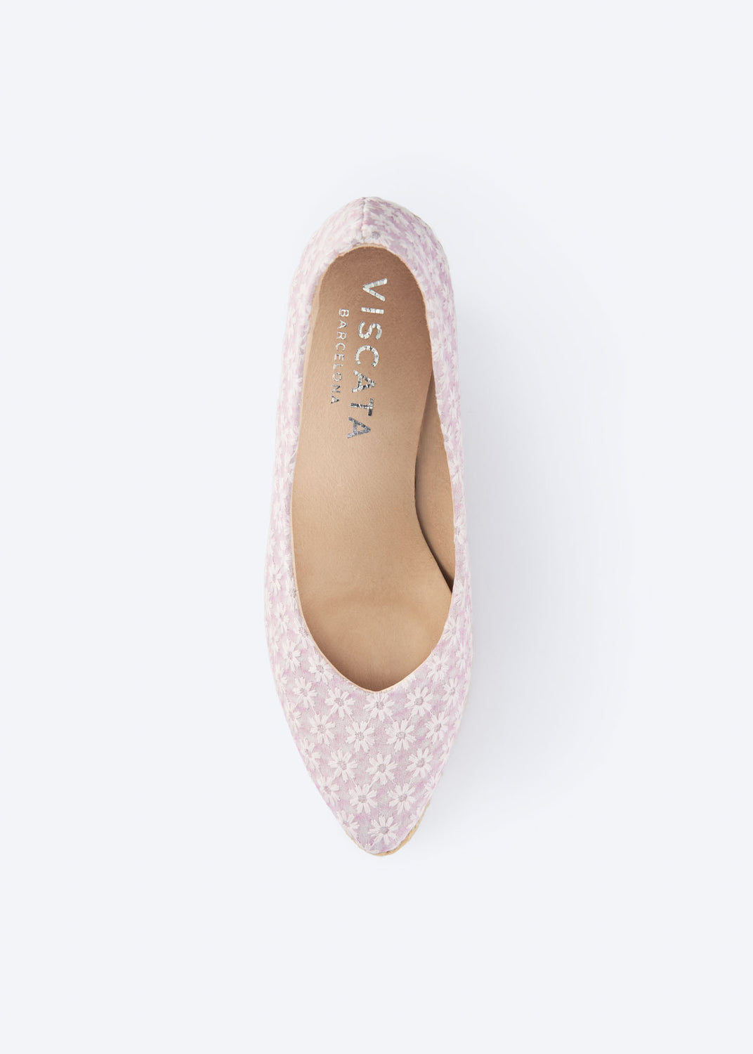 Top view of a pale pink floral wedge espadrille pump with a pointed toe silhouette, handcrafted in Spain