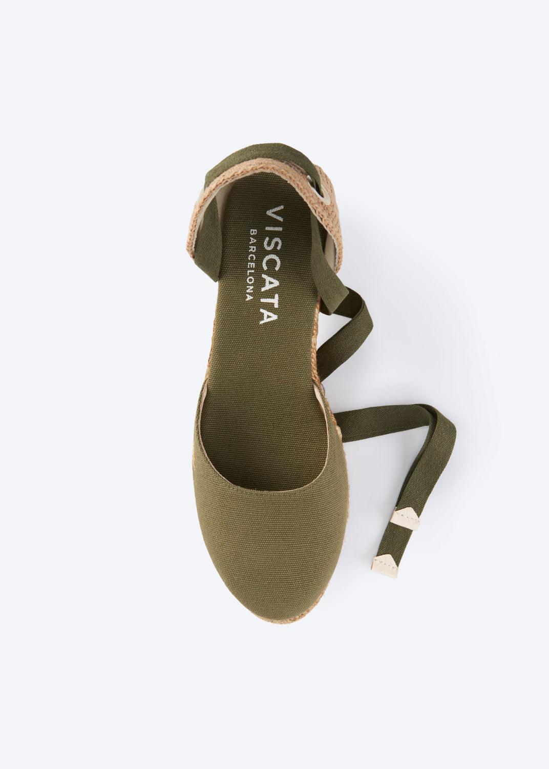Top view of olive green espadrille sandal with wraparound ankle ties and a closed toe, handcrafted in Spain