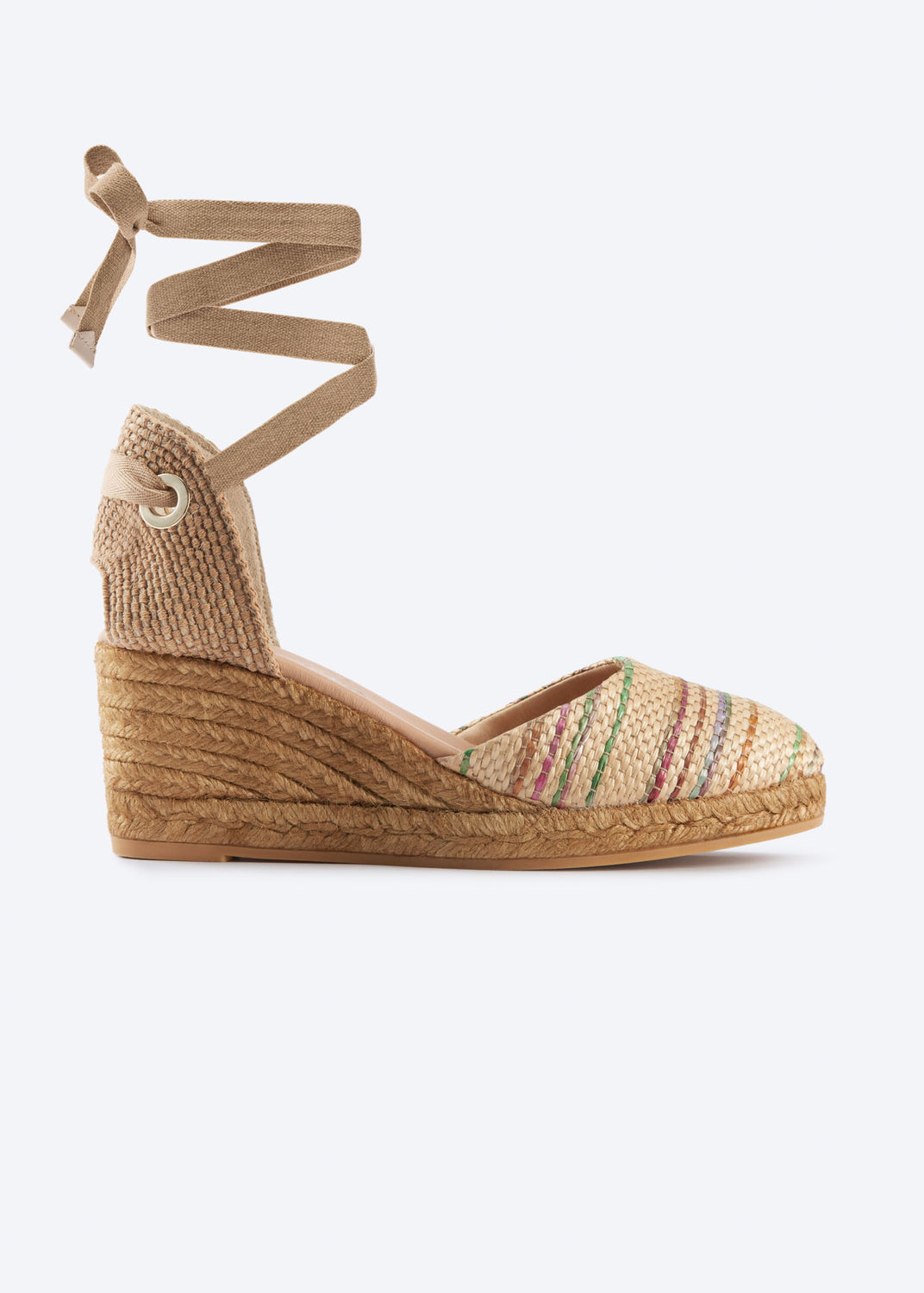 Side view of multicolor raffia espadrille wedge with wraparound ankle ties and a natural braided jute heel, handcrafted in Spain