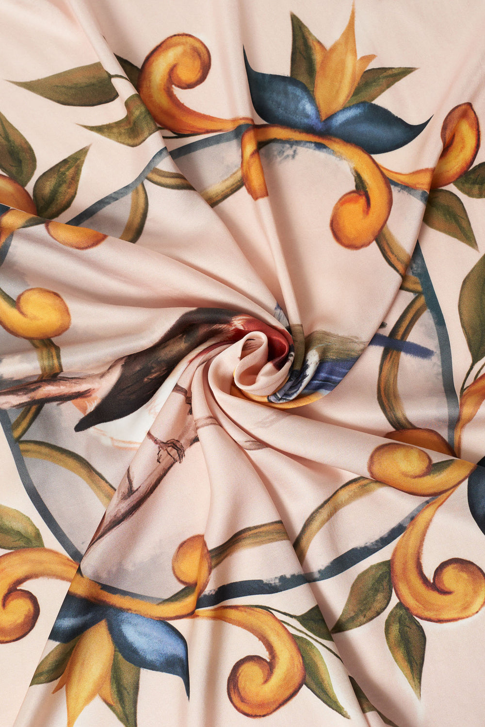 Close-up of luxurious square scarf with Mediterranean floral and bird print, showcasing elegant swirl pattern, soft drape, and vibrant hand-painted details – premium accessory with artisanal charm