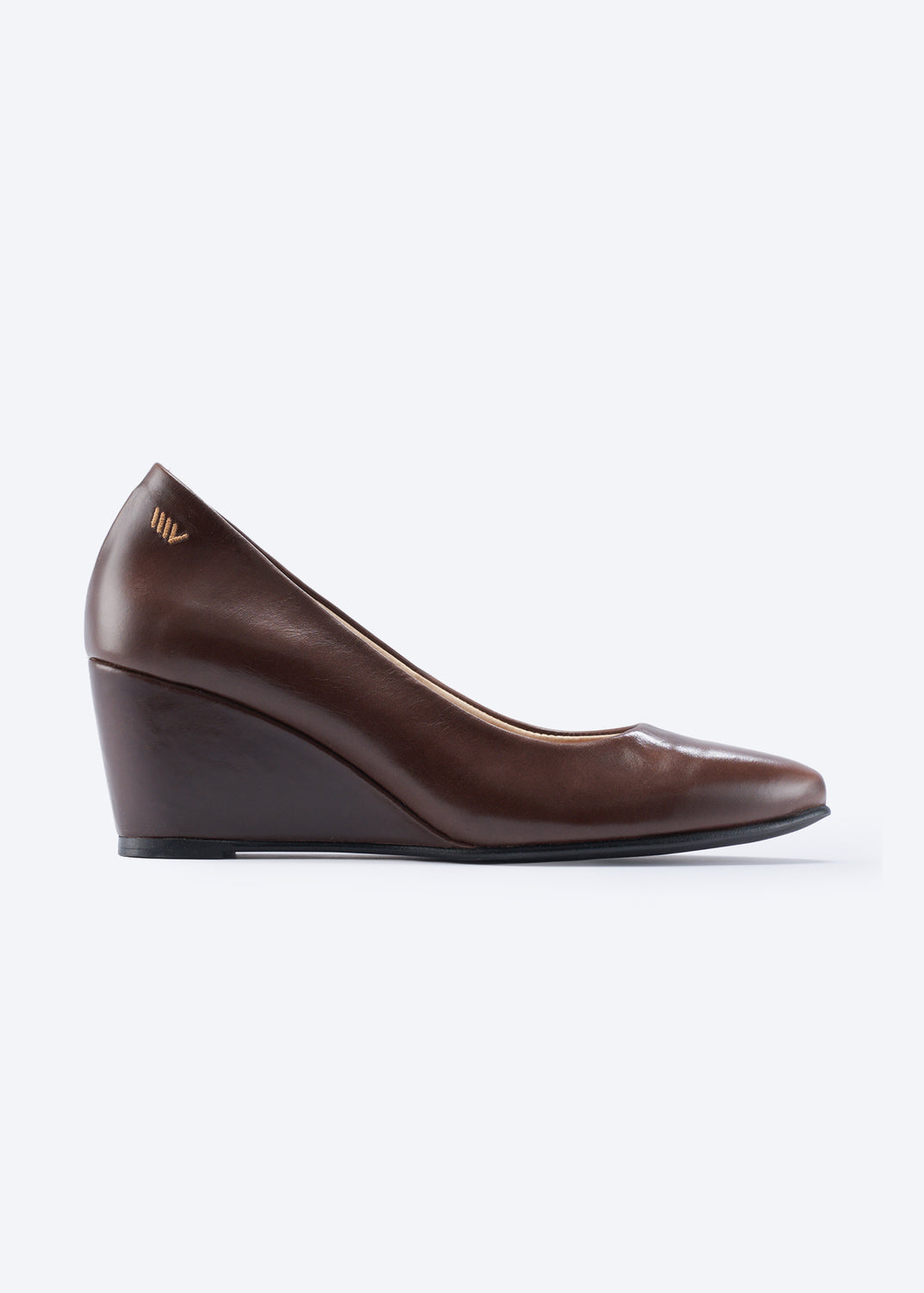 A single dark brown leather wedge pump shoe shown in a side profile view against a clean white background.